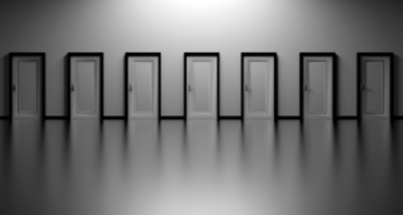 Line of doors on white wall